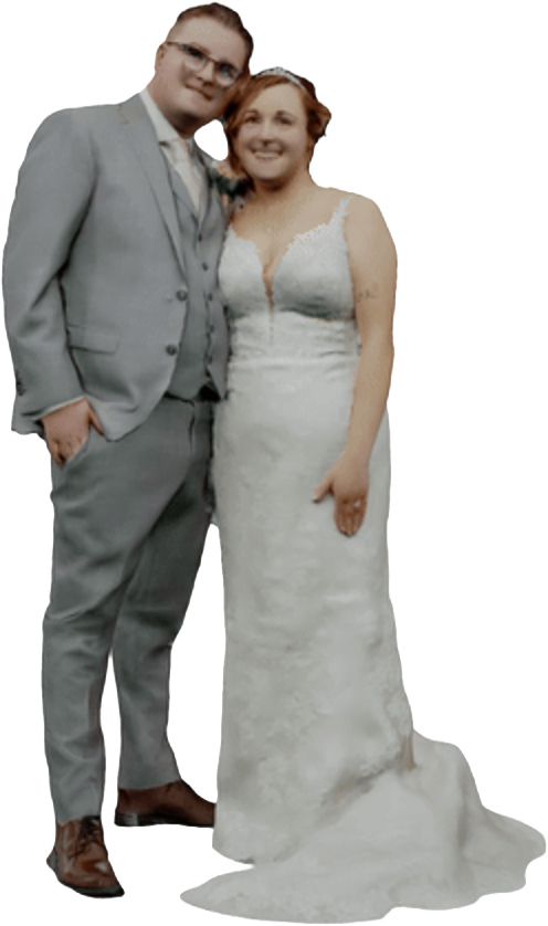 Happy couple with their 3D printed wedding figurine