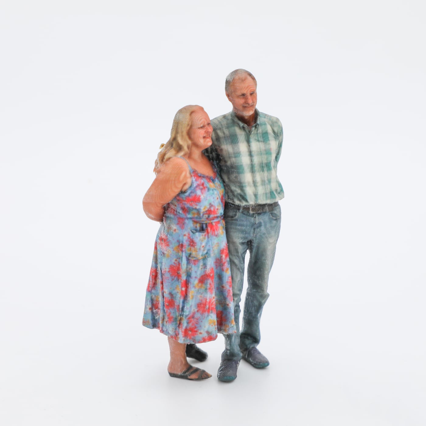 A mother and son captured together as 3D printed figurines