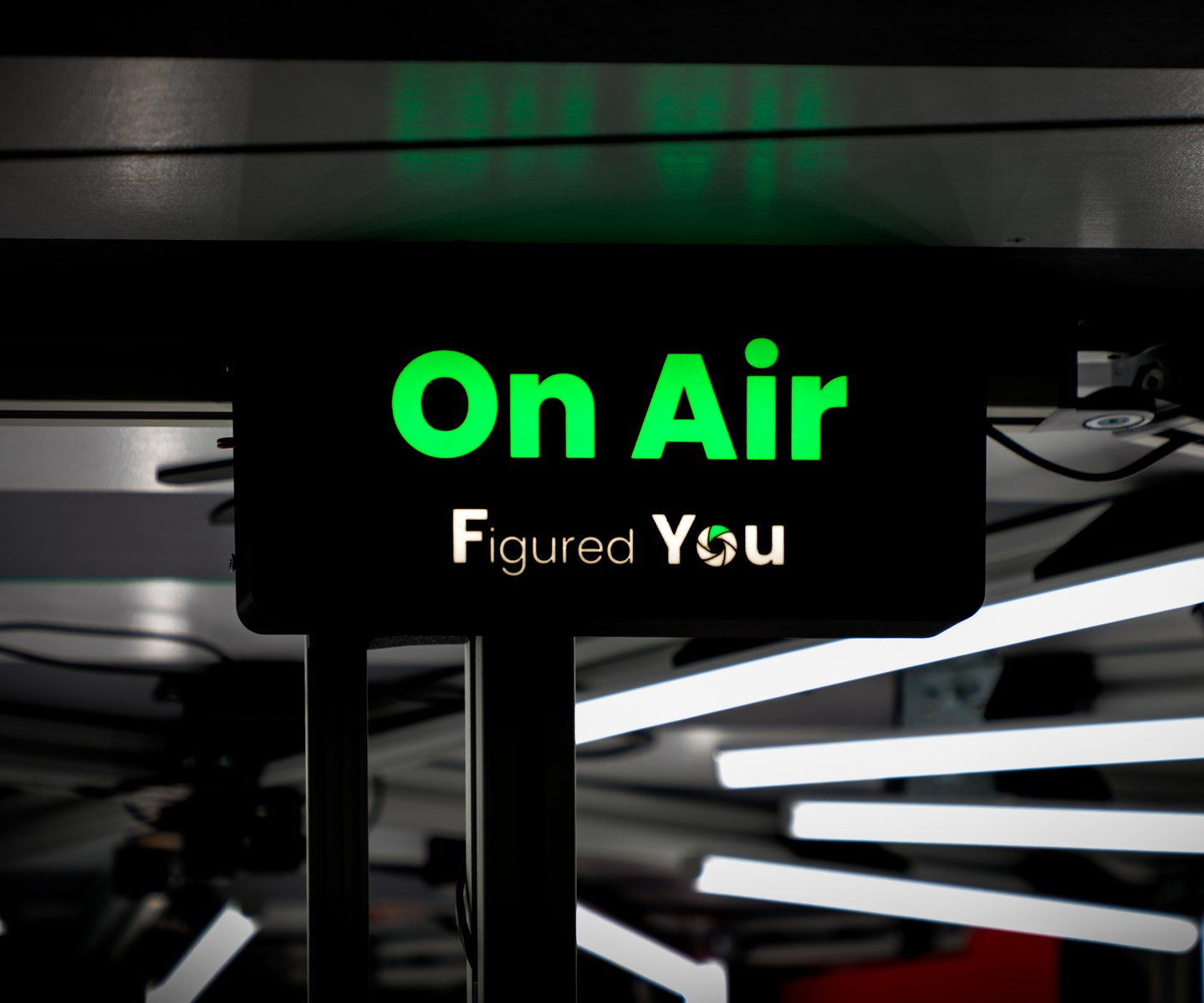 The illuminated On Air sign inside the Figured You scanning rig, lit by the studio&rsquo;s LED light bars