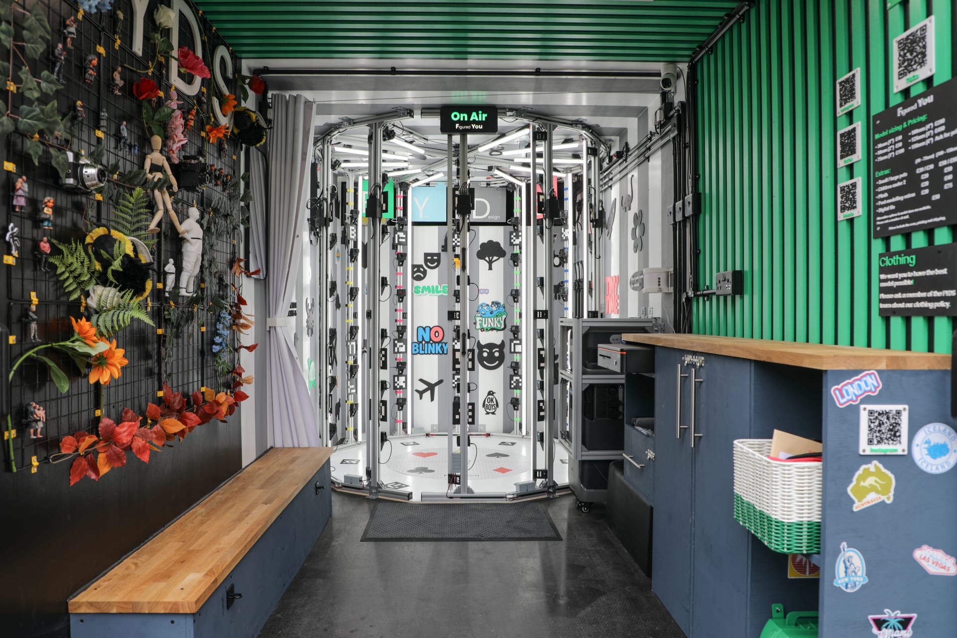Inside the mobile studio, with the scanning rig and bench seating