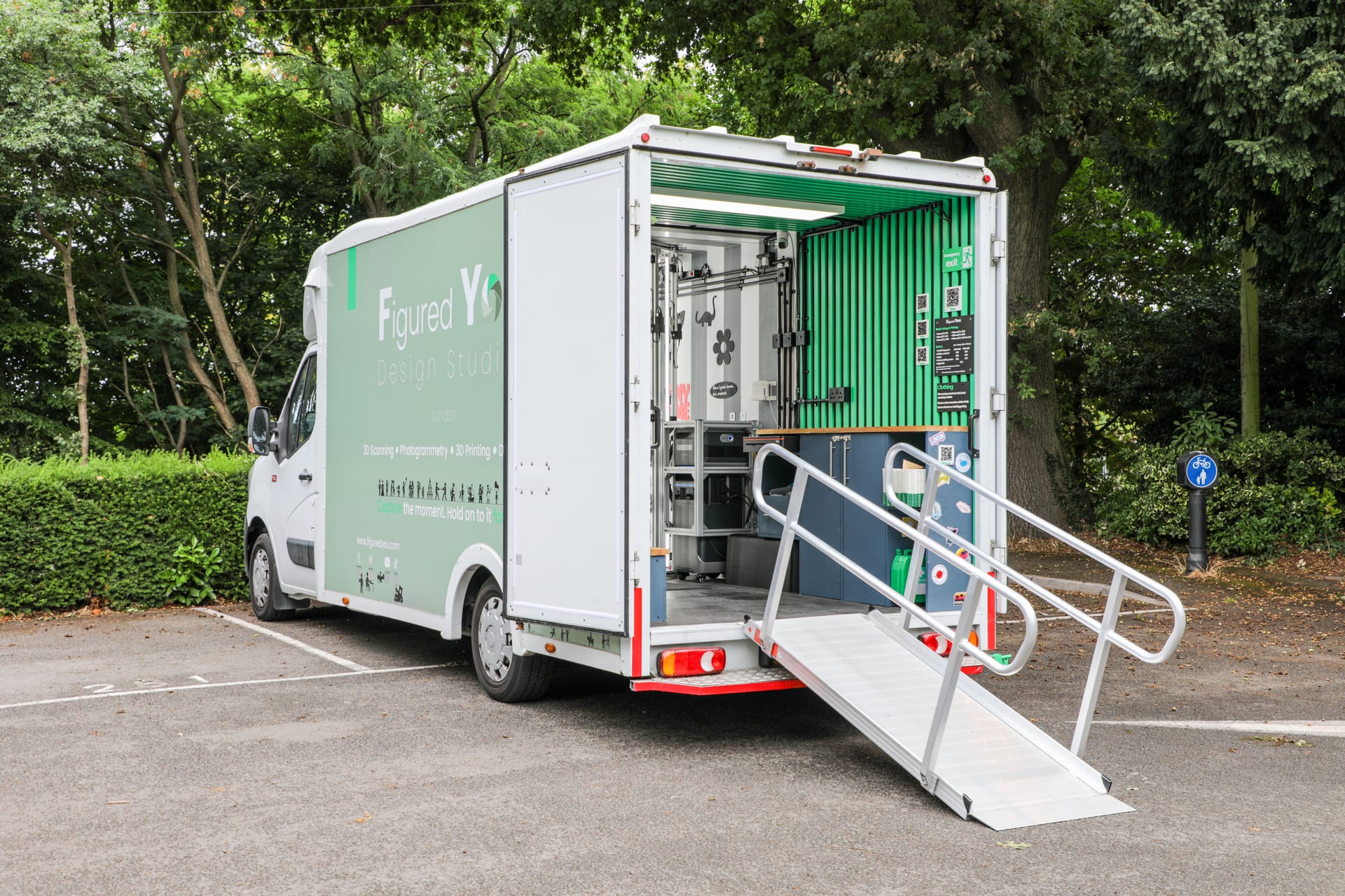 The rear of the studio van with doors open